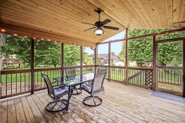 121 Arbor St, Northfield, MN 55057 - sunroom / solarium with outdoor dining area, a ceiling fan, vaulted ceiling, and a residential view