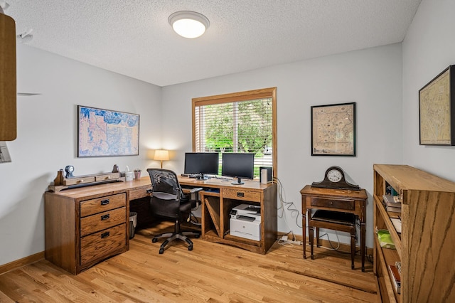 121 Arbor St, Northfield, MN 55057 - office space with light wood-style floors and a textured ceiling