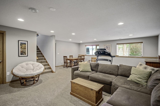 121 Arbor St, Northfield, MN 55057 - living area featuring light carpet, stairway, recessed lighting, and a textured ceiling