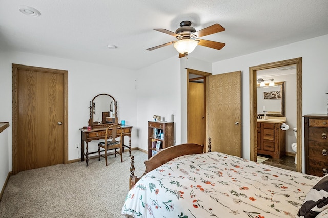 121 Arbor St, Northfield, MN 55057 - carpeted bedroom with a ceiling fan and ensuite bath