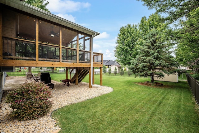 121 Arbor St, Northfield, MN 55057 - fenced backyard featuring a sunroom, stairway, and a patio