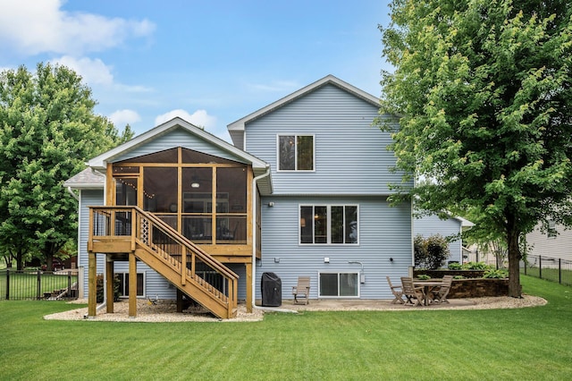 121 Arbor St, Northfield, MN 55057 - back of house featuring a sunroom, stairs, and a patio