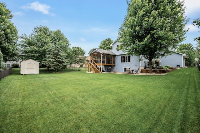 121 Arbor St, Northfield, MN 55057 - fenced backyard with a sunroom, a storage unit, and stairway