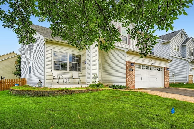 6788 Carlisle Curv, Shakopee, MN 55379 - view of property hidden behind natural elements featuring driveway and an attached garage