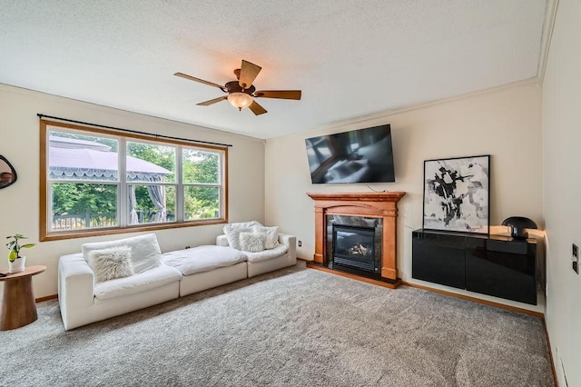 6788 Carlisle Curv, Shakopee, MN 55379 - carpeted living room with ceiling fan, a premium fireplace, crown molding, and a textured ceiling