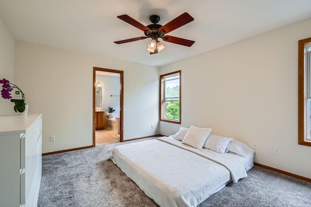 6788 Carlisle Curv, Shakopee, MN 55379 - bedroom with light carpet, ensuite bathroom, and ceiling fan