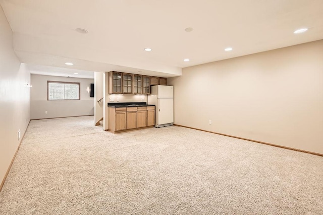6788 Carlisle Curv, Shakopee, MN 55379 - unfurnished living room with light colored carpet, recessed lighting, and bar