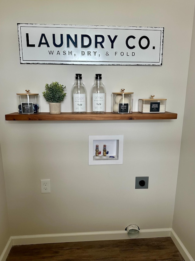 720 Cherrywood Ln NE, Isanti, MN 55040 - laundry room with hookup for an electric dryer, hookup for a washing machine, and wood finished floors