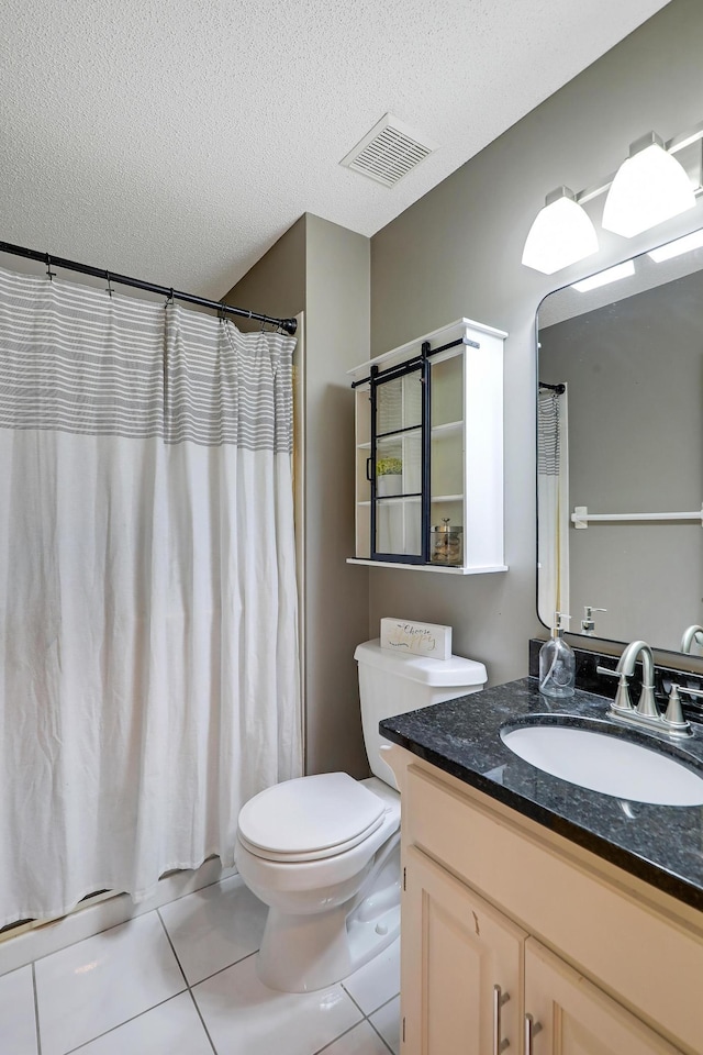 10902 Eagle Lake Blvd, Maple Grove, MN 55369 - bathroom featuring tile patterned floors, vanity, a textured ceiling, and curtained shower