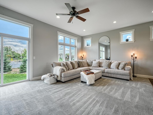 6937 94th St S, Cottage Grove, MN 55016 - carpeted living room with recessed lighting, a ceiling fan, and arched walkways