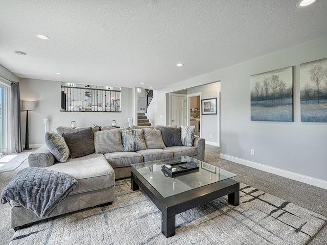 6937 94th St S, Cottage Grove, MN 55016 - carpeted living area with a textured ceiling, stairs, and recessed lighting