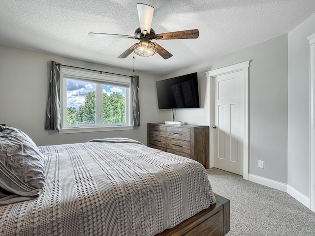 6937 94th St S, Cottage Grove, MN 55016 - bedroom with light colored carpet, a ceiling fan, and a textured ceiling