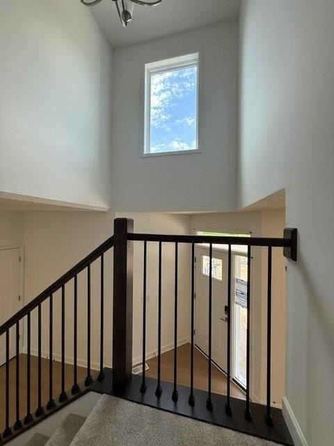 7200 Auburn Ln, Inver Grove Heights, MN 55077 - stairs with a chandelier and a towering ceiling