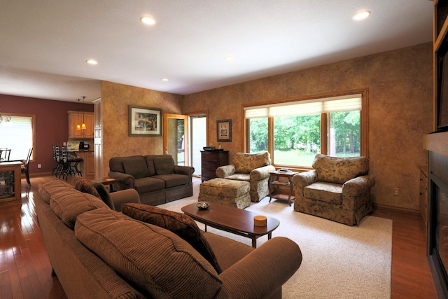 21601 Timber Hills Trl, Nisswa, MN 56468 - living room featuring wood finished floors, a fireplace, and recessed lighting