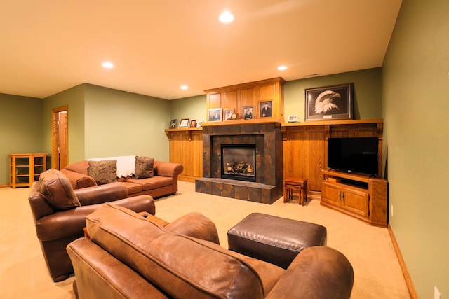 21601 Timber Hills Trl, Nisswa, MN 56468 - living area featuring carpet floors, a tiled fireplace, and recessed lighting