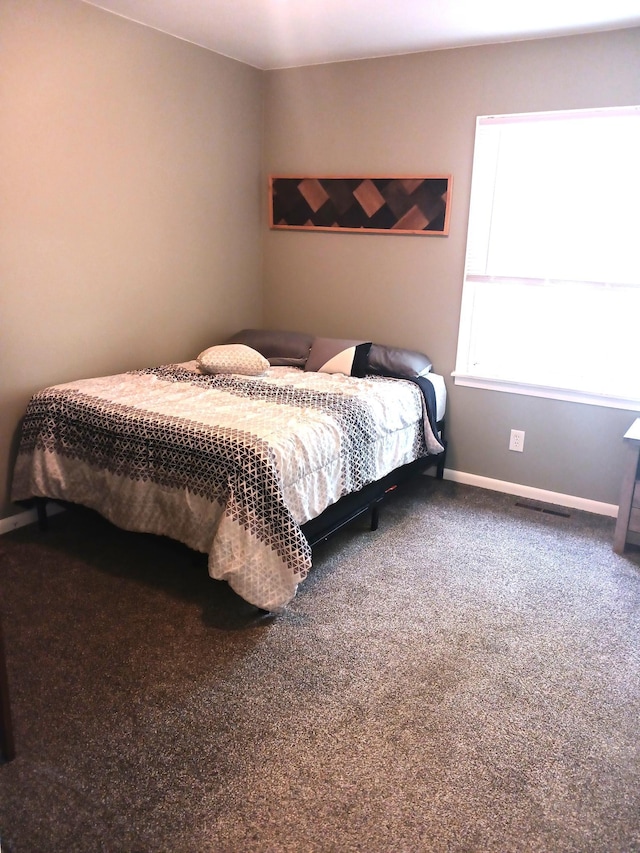 1235 Mitchell Pl, Fergus Falls, MN 56537 - carpeted bedroom featuring baseboards