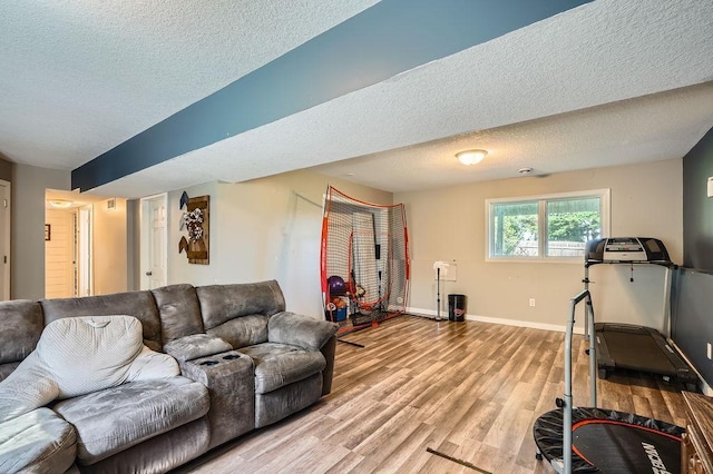 1301 English Ave NW, New Prague, MN 56071 - living room featuring a textured ceiling and light wood finished floors