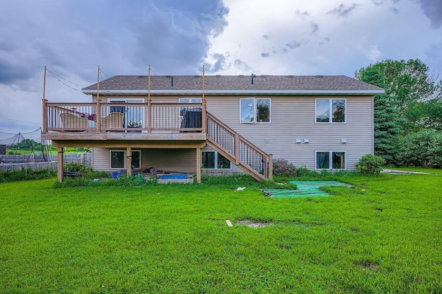 1301 English Ave NW, New Prague, MN 56071 - back of property with a deck, a lawn, stairway, and a shingled roof