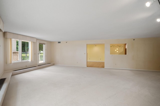 5011 Lake Ave Unit 105, White Bear Lake, MN 55110 - unfurnished room with carpet and baseboard heating