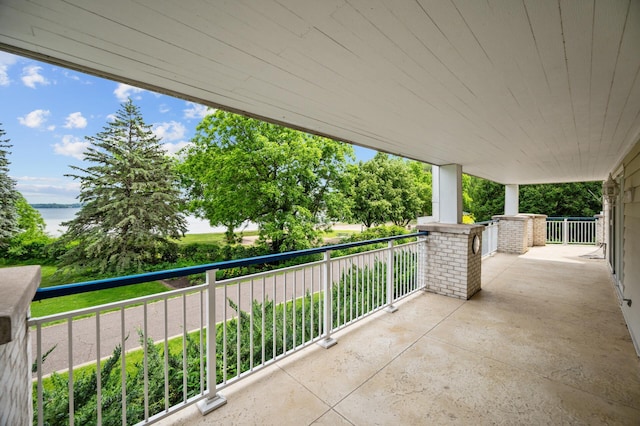 5011 Lake Ave Unit 105, White Bear Lake, MN 55110 - patio / terrace with a water view
