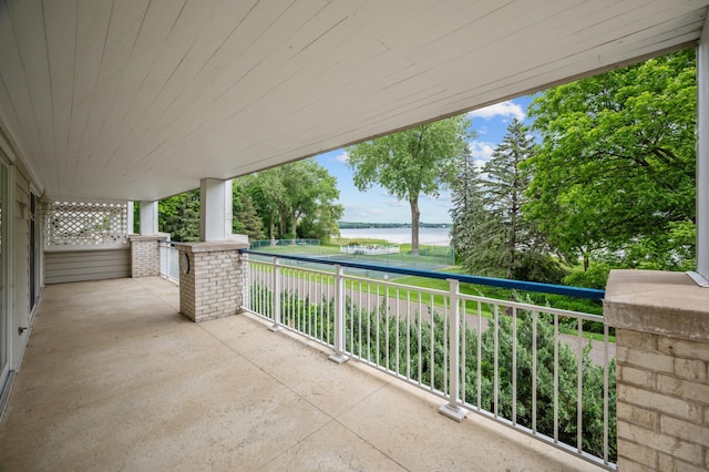 5011 Lake Ave Unit 105, White Bear Lake, MN 55110 - view of patio featuring a water view