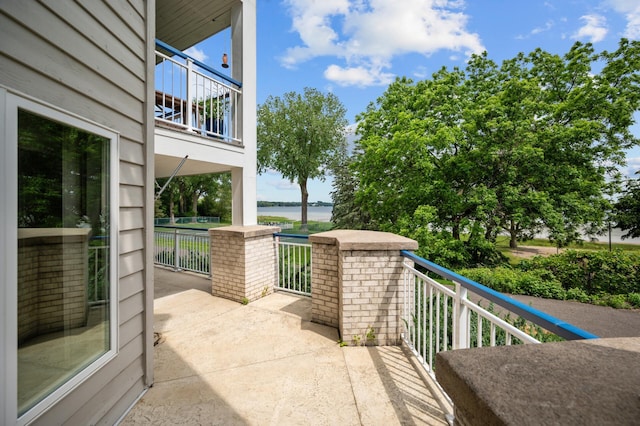 5011 Lake Ave Unit 105, White Bear Lake, MN 55110 - patio / terrace featuring a water view
