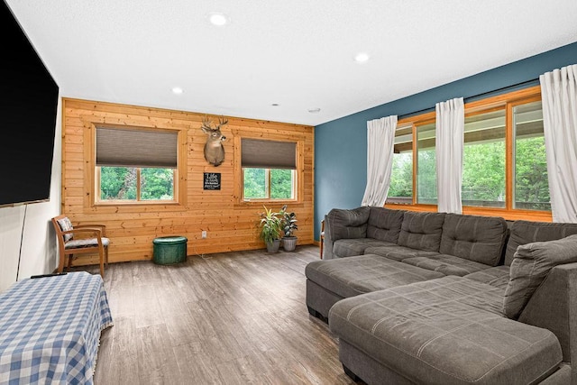 4984 Tower Rd, Moose Lake, MN 55767 - living room featuring wood walls, wood finished floors, and recessed lighting