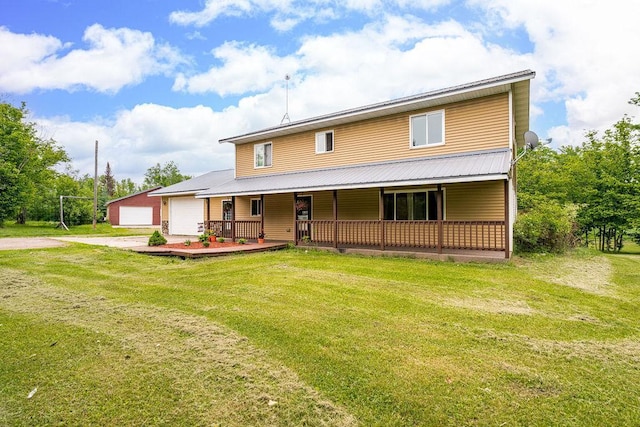 4984 Tower Rd, Moose Lake, MN 55767 - farmhouse featuring a porch, driveway, a front lawn, and an attached garage