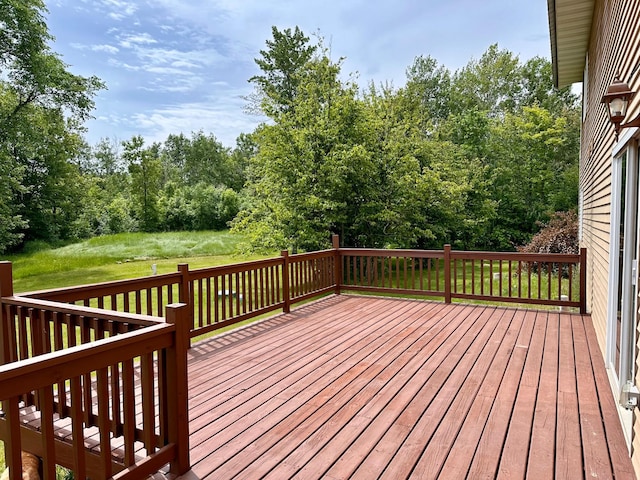4984 Tower Rd, Moose Lake, MN 55767 - wooden terrace featuring a lawn