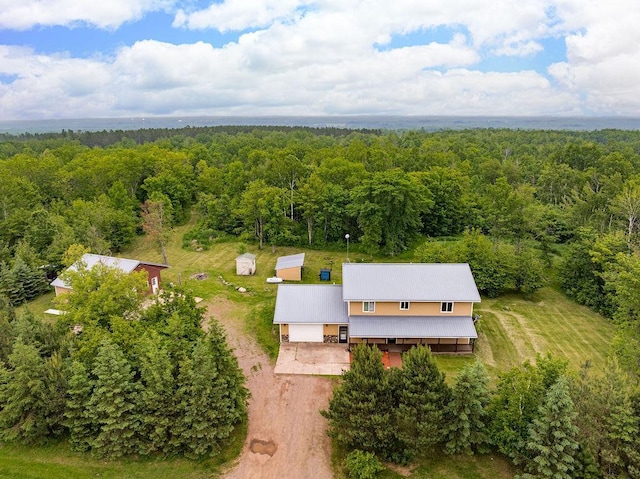 4984 Tower Rd, Moose Lake, MN 55767 - aerial view of property and surrounding area featuring a heavily wooded area