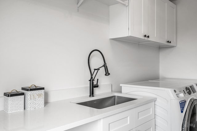 9930 14th Cir NE, Saint Michael, MN 55376 - washroom with washing machine and clothes dryer and cabinet space