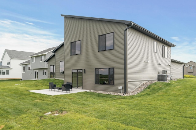 9930 14th Cir NE, Saint Michael, MN 55376 - back of property featuring a patio area and a lawn
