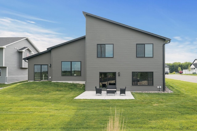 9930 14th Cir NE, Saint Michael, MN 55376 - back of property featuring a patio and a yard