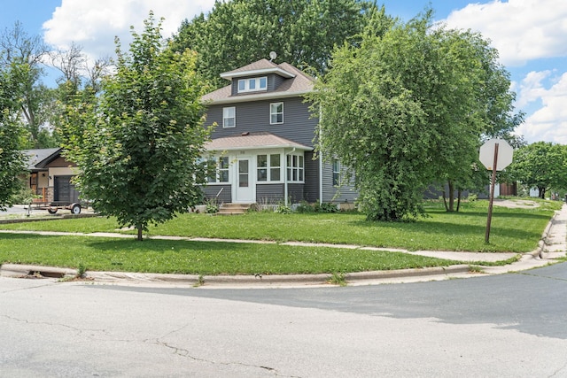 213 2nd St NE, Grand Meadow, MN 55936 - american foursquare style home with entry steps and a front yard