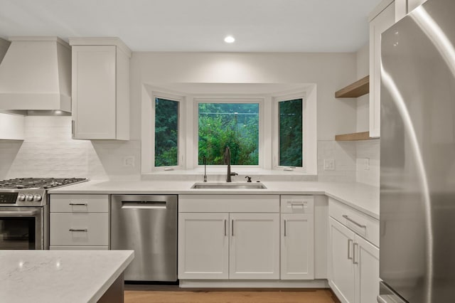 2022 Lake Rd, Minnetonka Beach, MN 55391 - kitchen with stainless steel appliances, open shelves, custom exhaust hood, recessed lighting, and white cabinets