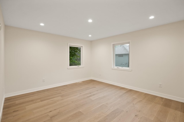 2022 Lake Rd, Minnetonka Beach, MN 55391 - unfurnished room with light wood-style floors and recessed lighting