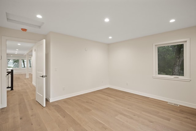 2022 Lake Rd, Minnetonka Beach, MN 55391 - empty room with light wood finished floors and recessed lighting