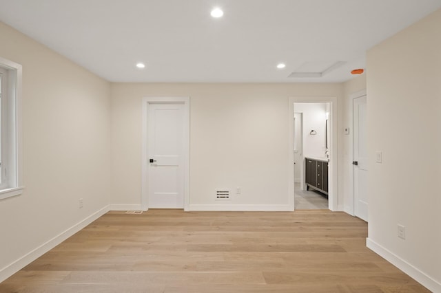 2022 Lake Rd, Minnetonka Beach, MN 55391 - empty room with recessed lighting and light wood-style flooring