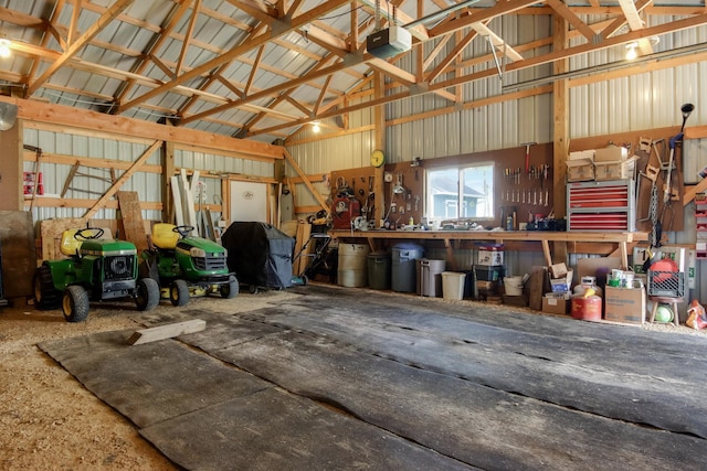 N2498 50th St, Union Twp, WI 54761 - garage featuring a workshop area and metal wall