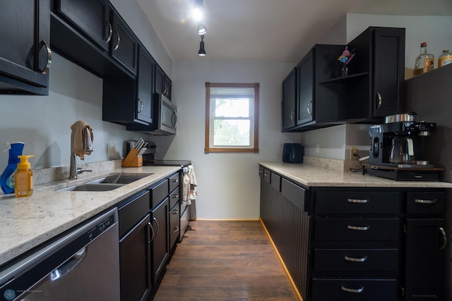 2901 10th Ave N, Fargo, ND 58102 - kitchen featuring stainless steel appliances, open shelves, dark wood-style flooring, and dark cabinetry