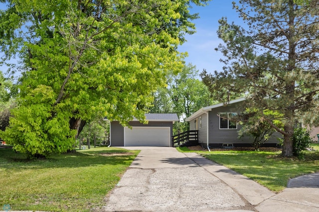 1031 7th St W, West Fargo, ND 58078 - view of property hidden behind natural elements with a front lawn and a garage