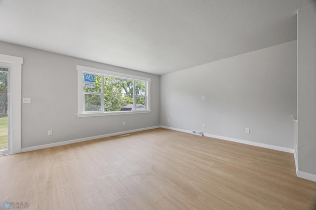 1031 7th St W, West Fargo, ND 58078 - empty room featuring light wood-style flooring