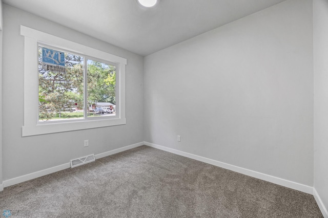 1031 7th St W, West Fargo, ND 58078 - carpeted spare room featuring baseboards