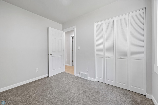 1031 7th St W, West Fargo, ND 58078 - unfurnished bedroom featuring carpet floors and a closet