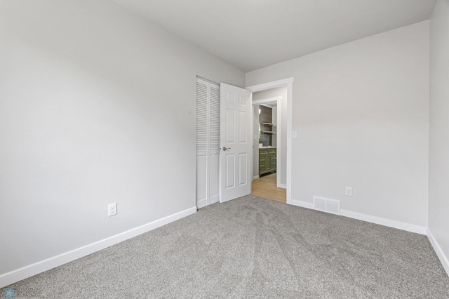 1031 7th St W, West Fargo, ND 58078 - unfurnished room with carpet floors and baseboards