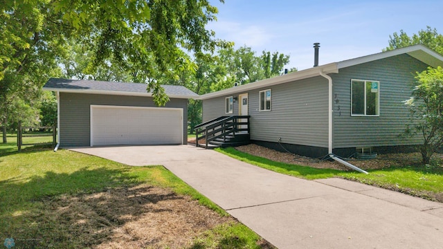 1031 7th St W, West Fargo, ND 58078 - view of front of property with a front yard and concrete driveway