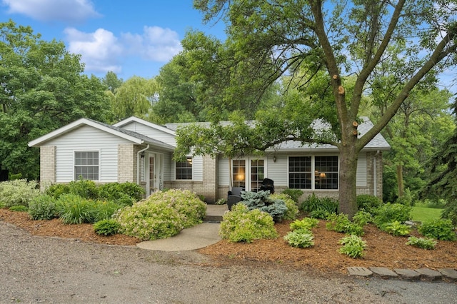 9372 71st St NE, Spicer, MN 56288 - ranch-style home featuring brick siding