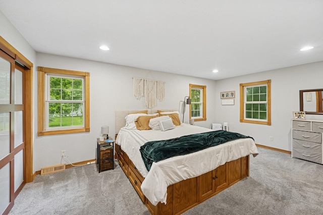 9372 71st St NE, Spicer, MN 56288 - bedroom featuring light colored carpet and recessed lighting