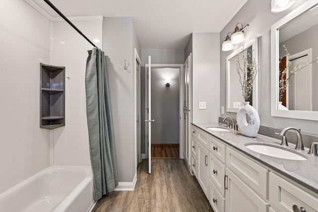 4128 Zane Ave N, Robbinsdale, MN 55422 - bathroom with double vanity, wood finished floors, and shower / tub combo with curtain