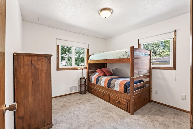 4128 Zane Ave N, Robbinsdale, MN 55422 - carpeted bedroom featuring baseboards